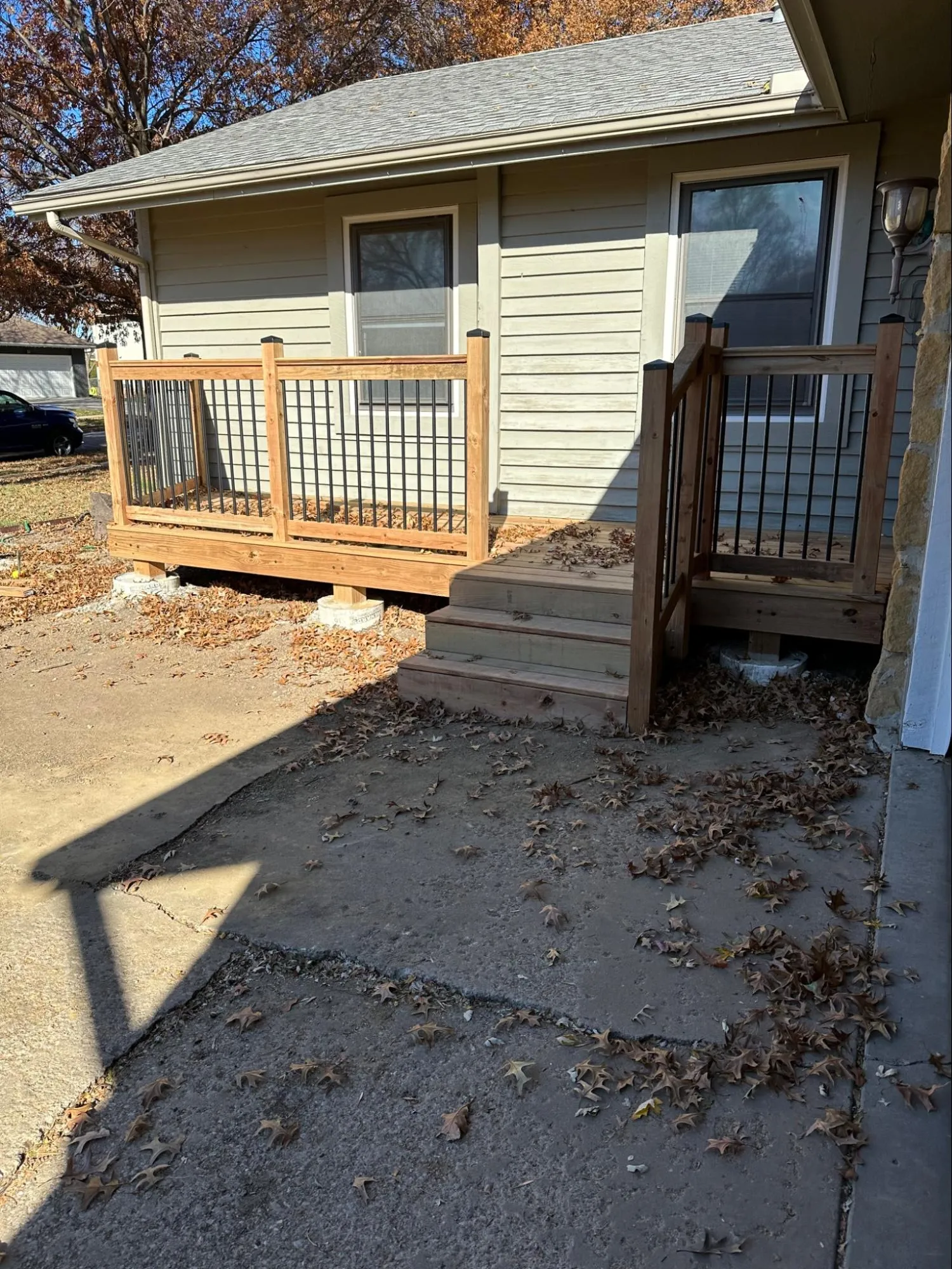 Finished residential deck featuring professional carpentry