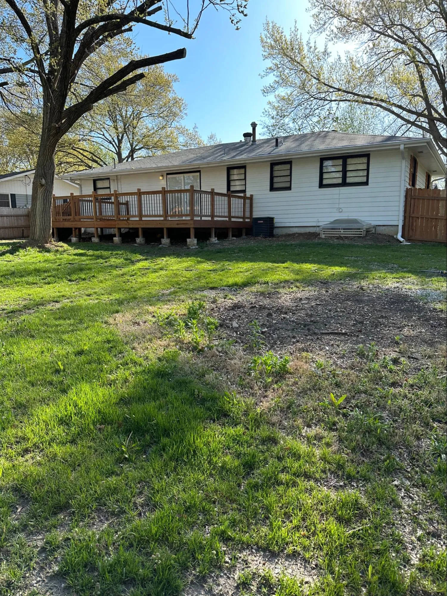Completed deck with professional carpentry and stained finish
