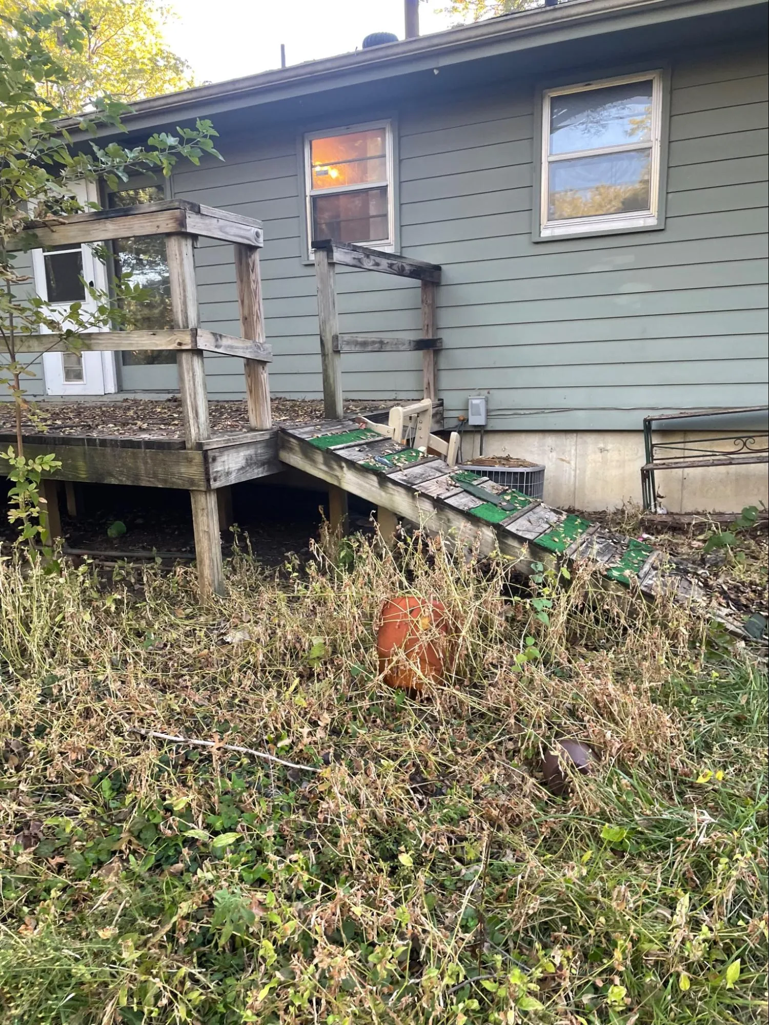 Deck before renovation with severe wood rot issues