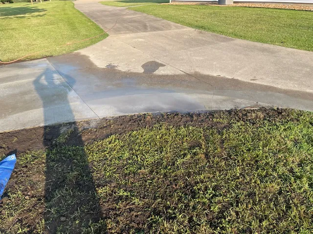Concrete driveway with excavation