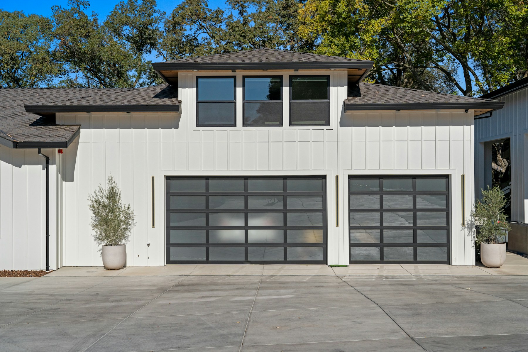 Well-maintained residential property with modern garage doors